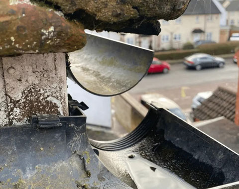 Gutter Cleaning - Step 3 Re-clipping and Flushing